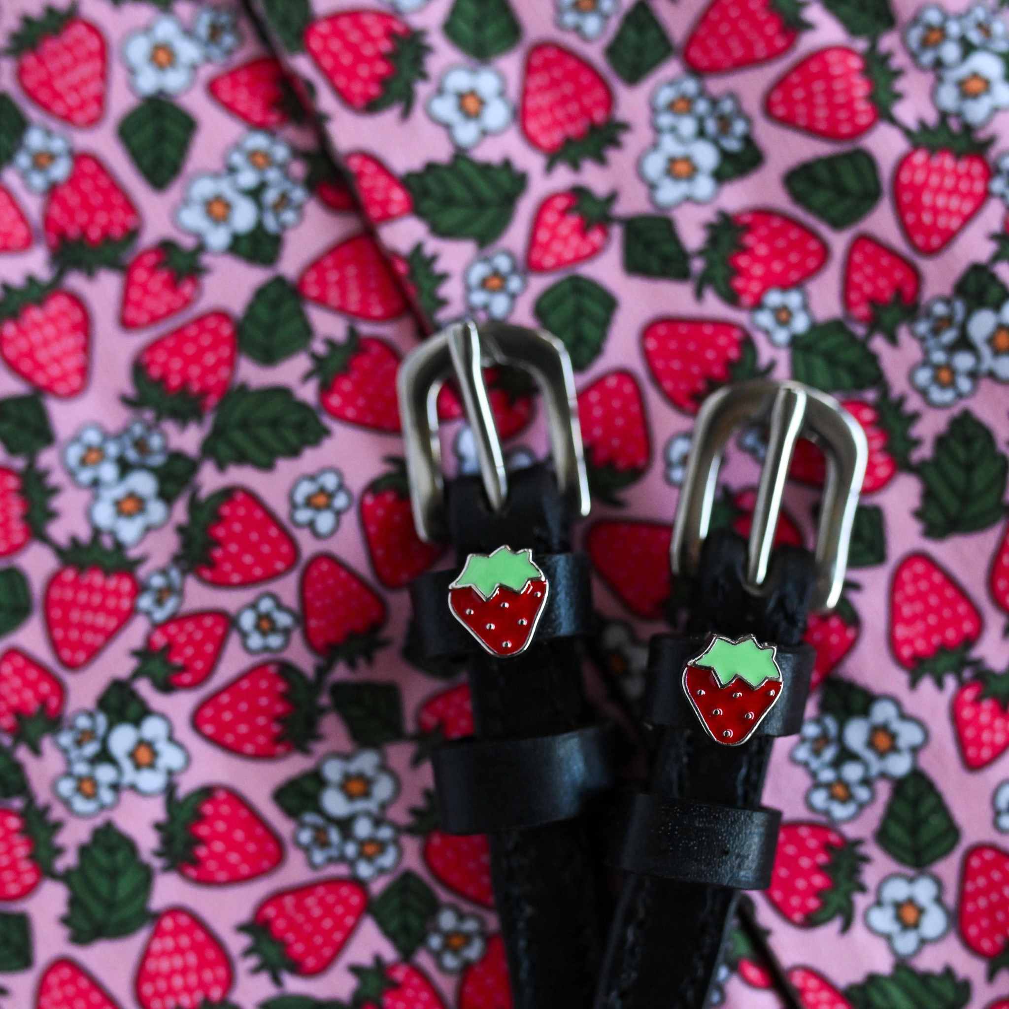 ManeJane Strawberry Spur Straps Spur Straps — black leather, non-stretch, hero image for English riders.