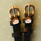 Sushi Spur Straps ManeJane black leather spur straps with non-stretch interior and stainless steel buckle for English ridin.