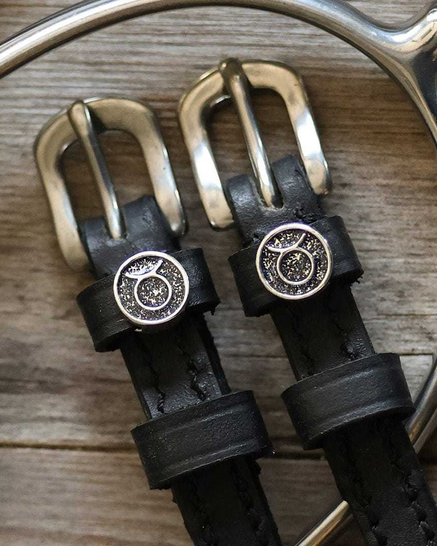 Black leather Taurus Spur Straps with stainless steel buckles and custom Taurus charms