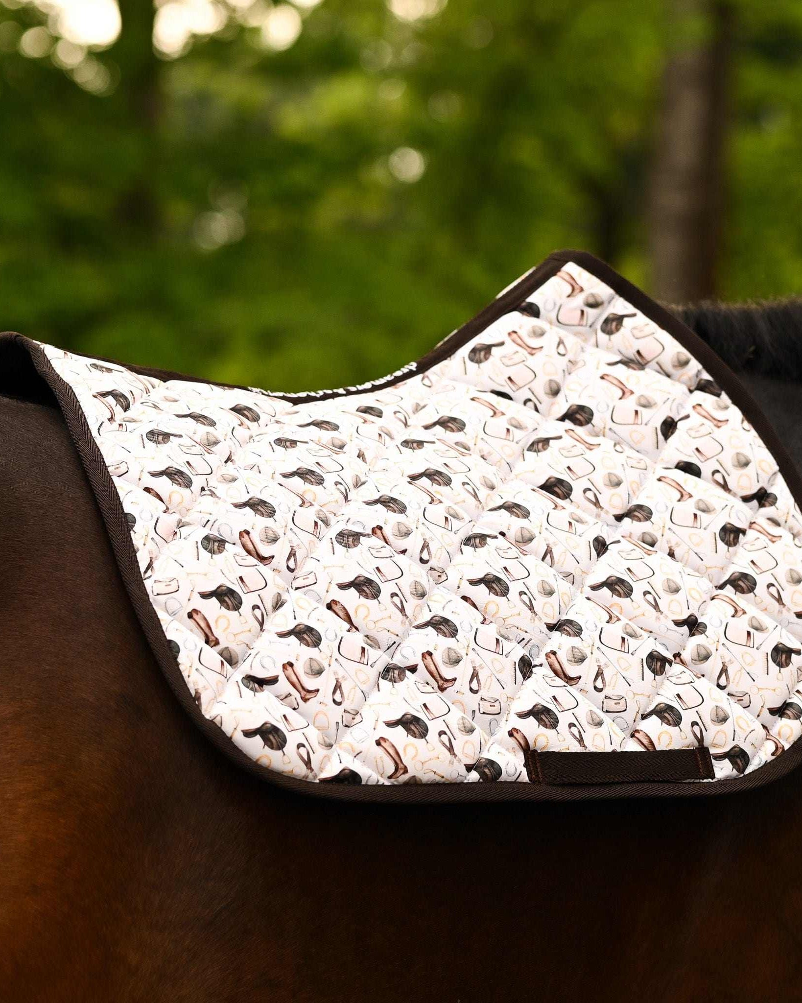The Hunt DERP all-purpose saddle pad, showing the full pattern layout, by Dreamers & Schemers