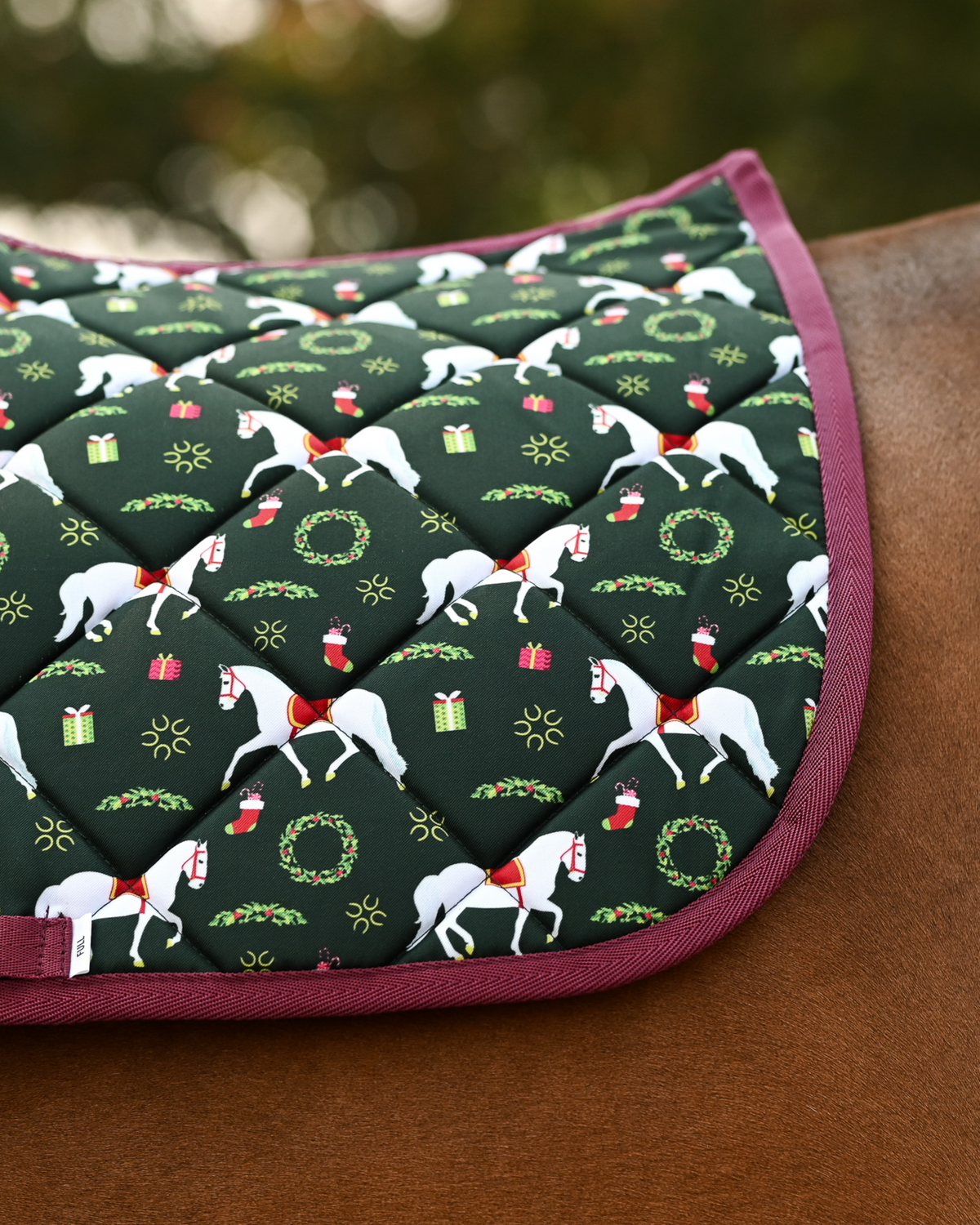 Close crop of the Lippizan Horses print — white dressage horses, holly wreaths and wrapped gifts
