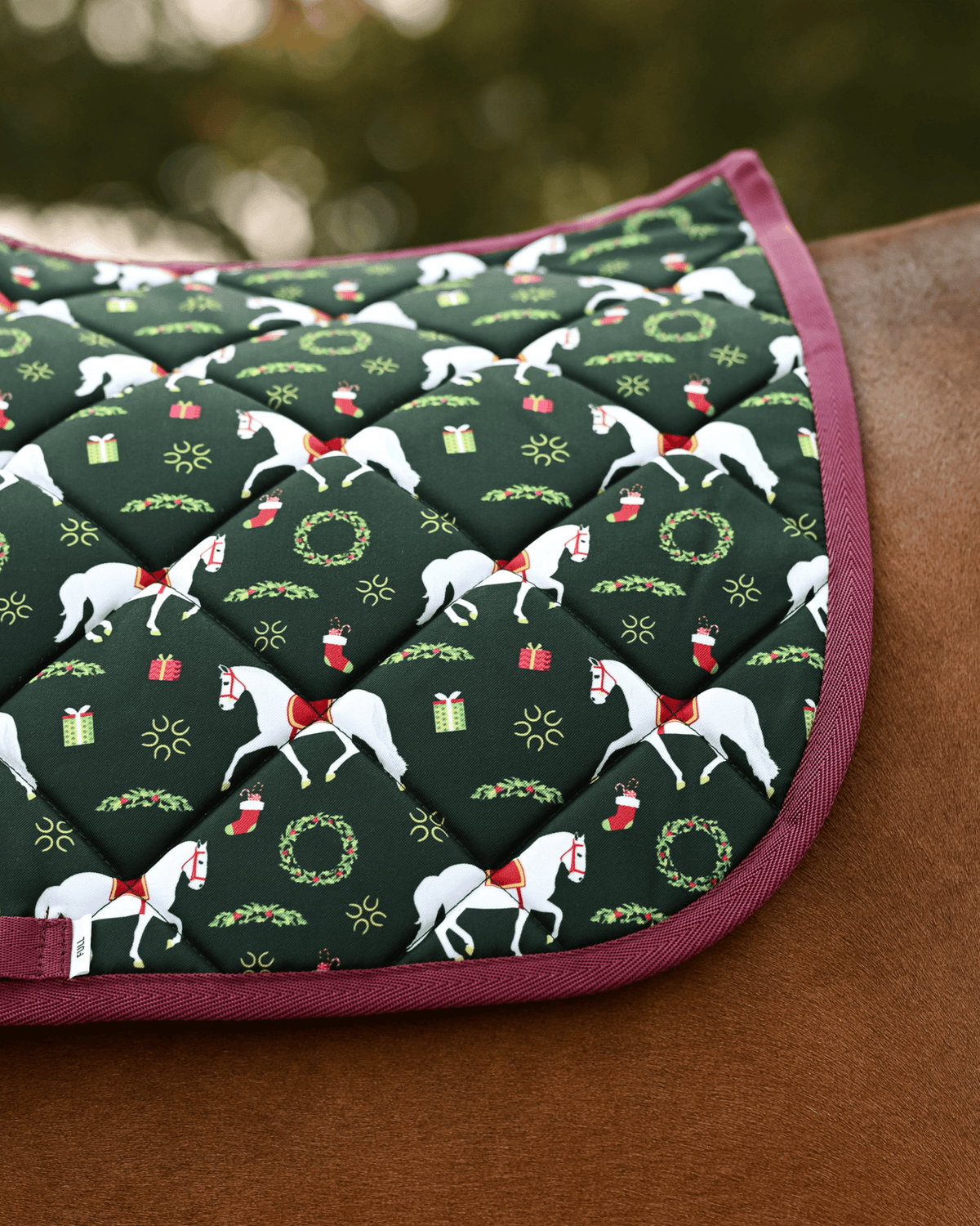 Close crop of the Lippizan Horses print — white dressage horses, holly wreaths and wrapped gifts