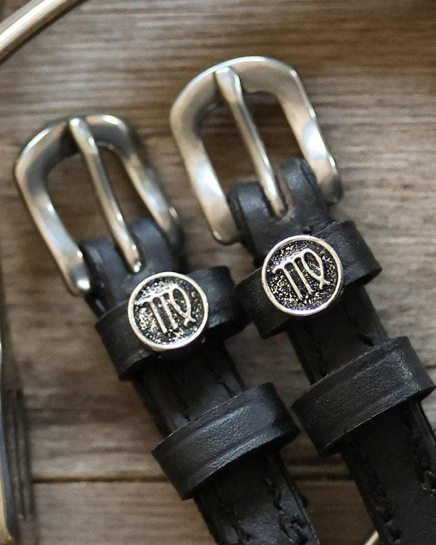 Virgo Spur Straps black leather with stainless steel buckle and Virgo charm close-up