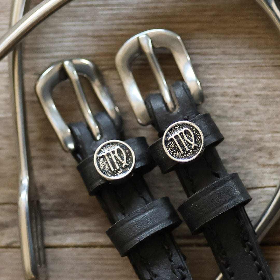 Virgo Spur Straps black leather with stainless steel buckle and Virgo charm close-up