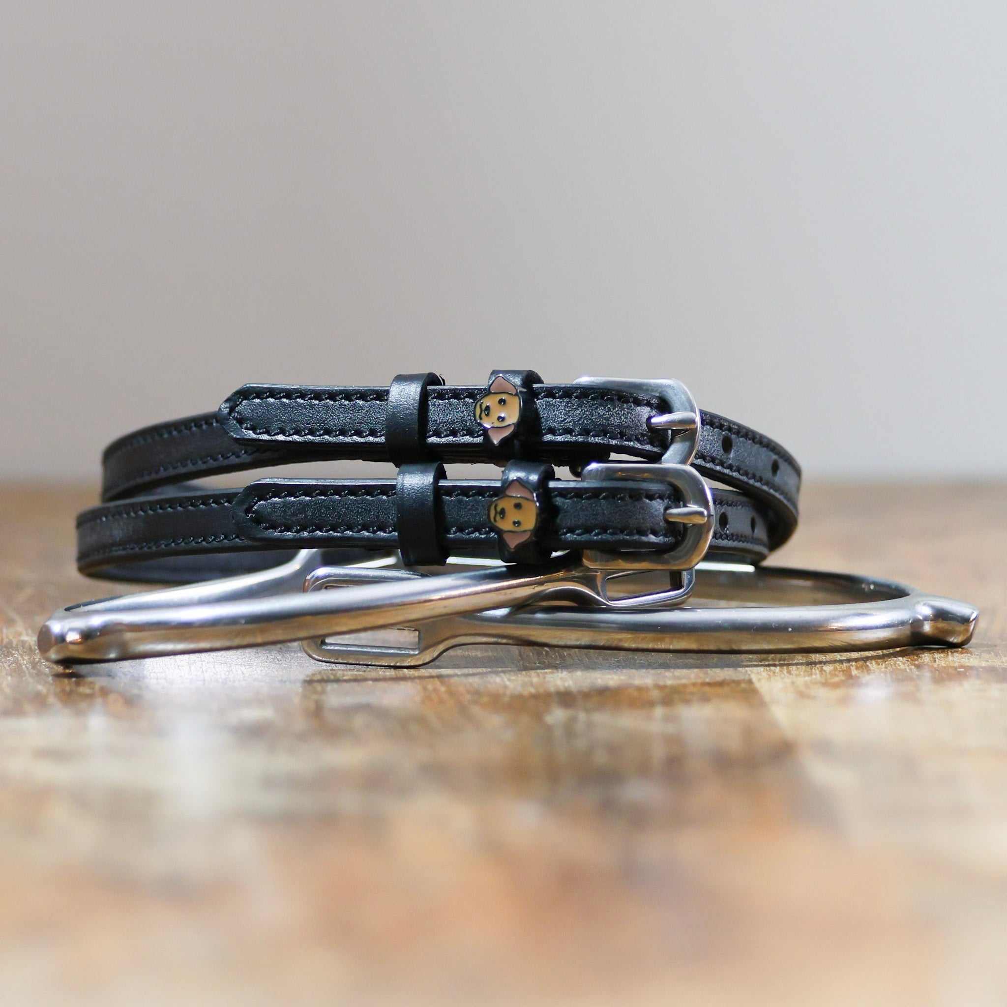 ManeJane Dog - Labrador Spur Straps Spur Straps — black leather, non-stretch, hero image for English riders.