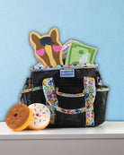 Feeling Stable grooming tote styled on a shelf with a curry comb and grooming sponges