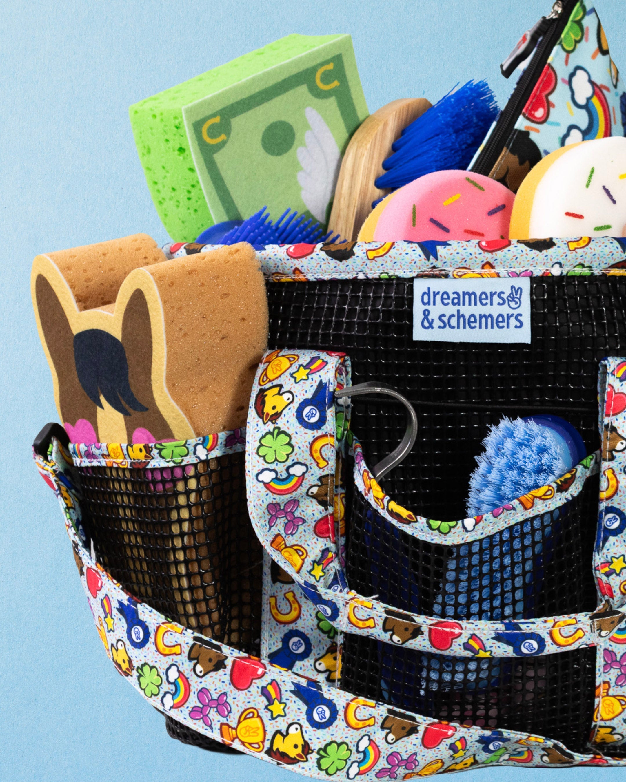Feeling Stable grooming tote filled with grooming supplies, woven dreamers & schemers label in view