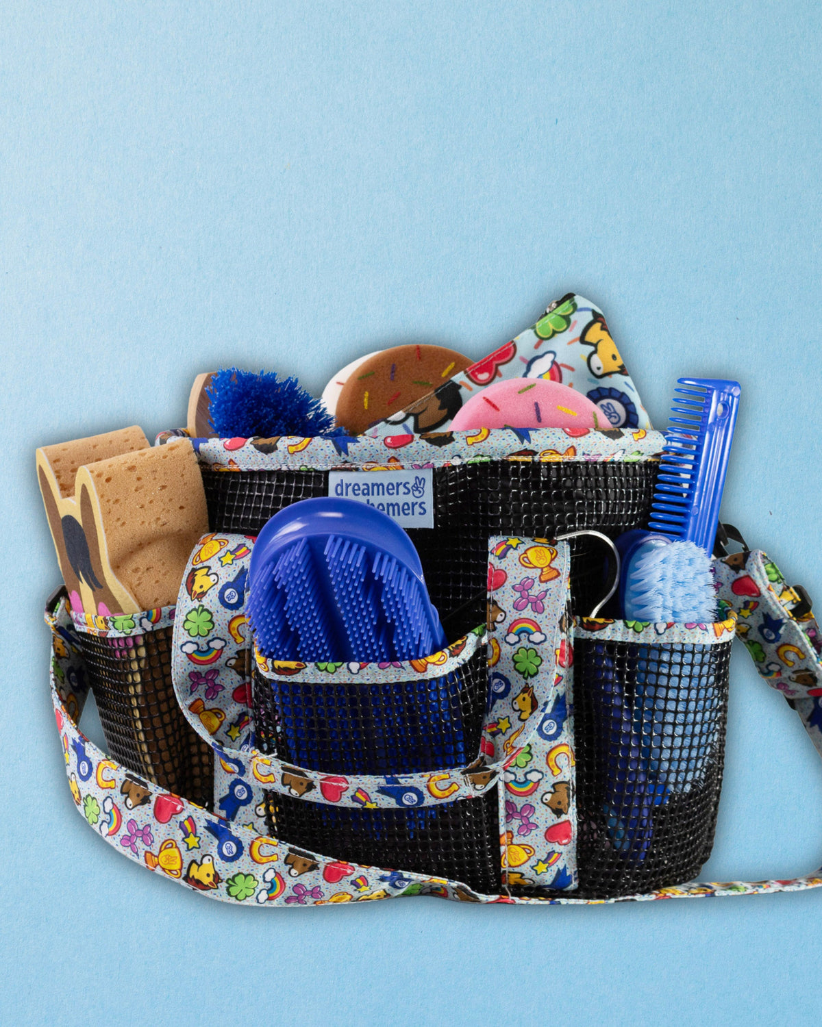 Feeling Stable grooming tote packed with brushes, sponges and a comb, by Dreamers & Schemers