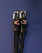 Crabbin' ManeJane spur straps with the signature Crabbin' charm, shown on a navy background