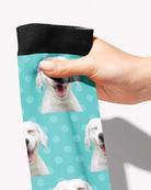 Dots custom photo equestrian boot socks, held in hand, close-up of the polka dot pattern, by Dreamers & Schemers