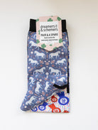 The Pony Island Peppermint Ponies boot socks shown folded with the included spare sock and printed cuff detail