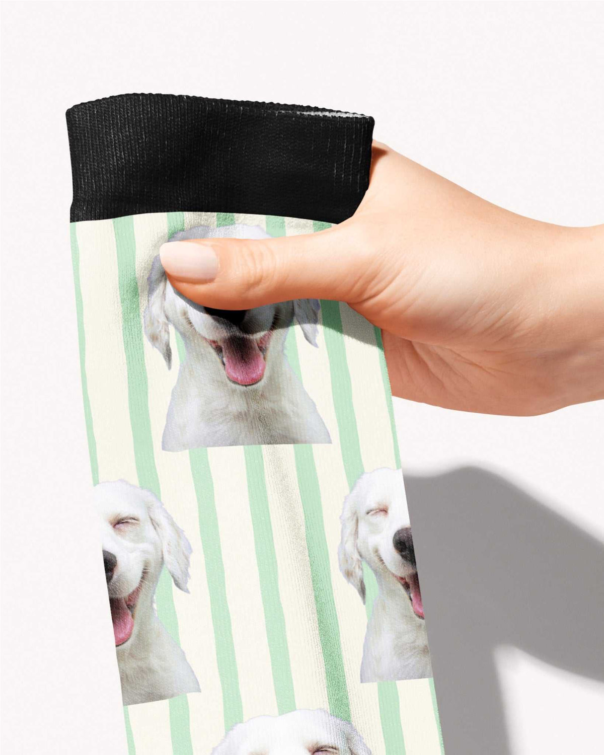 Stripes custom photo equestrian boot socks, held in hand, close-up of the mint stripe pattern, by Dreamers & Schemers