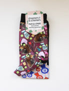 Mani Pedi boot socks shown folded with the included spare sock and printed cuff detail