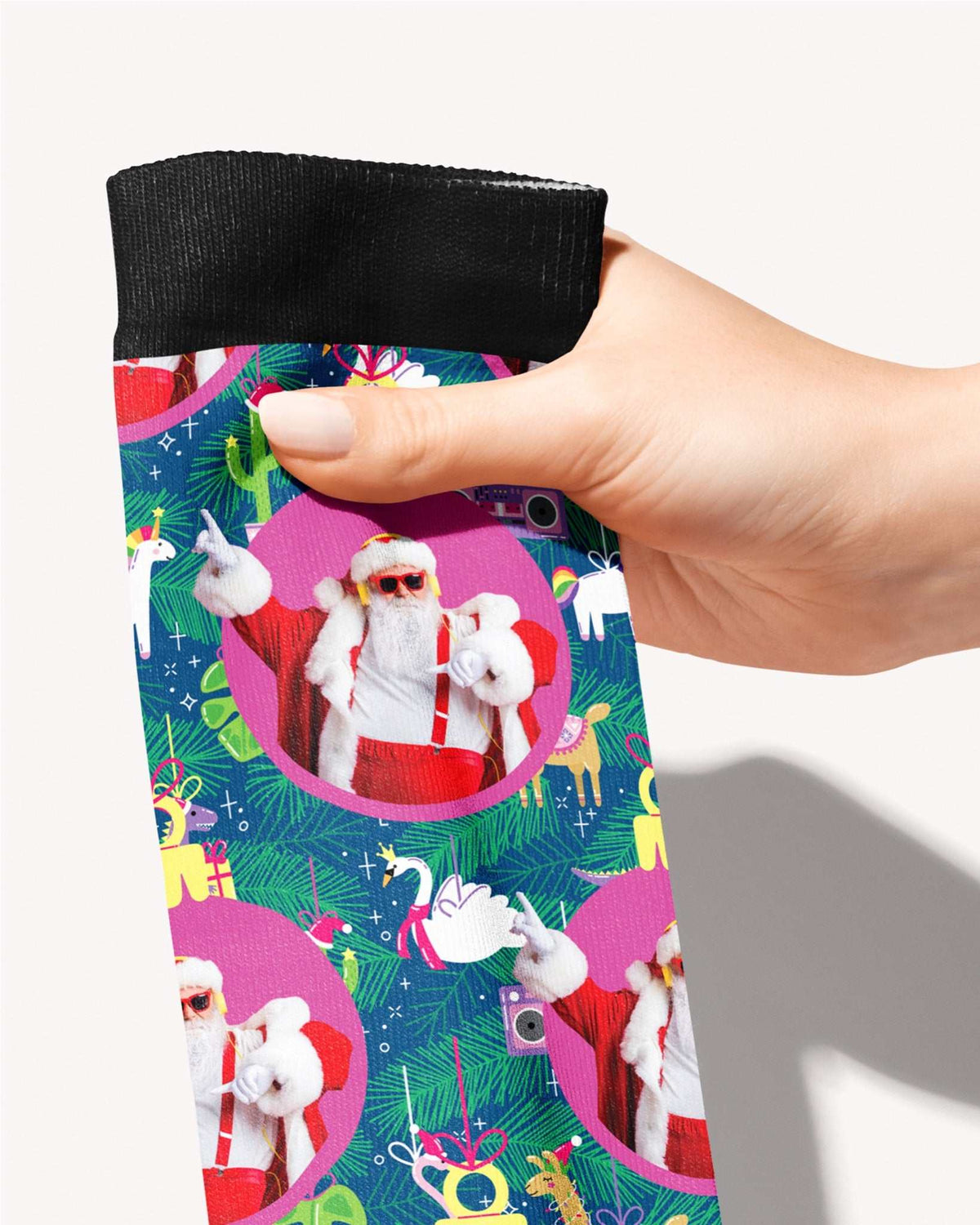Bauble Bonanza custom photo equestrian boot socks, held in hand, close-up of the pink ornament bauble pattern, by Dreamers & Schemers
