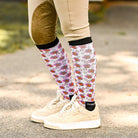 Zero Fox Given Bundle knee-high socks with sassy fox design worn with beige riding pants and cream sneakers
