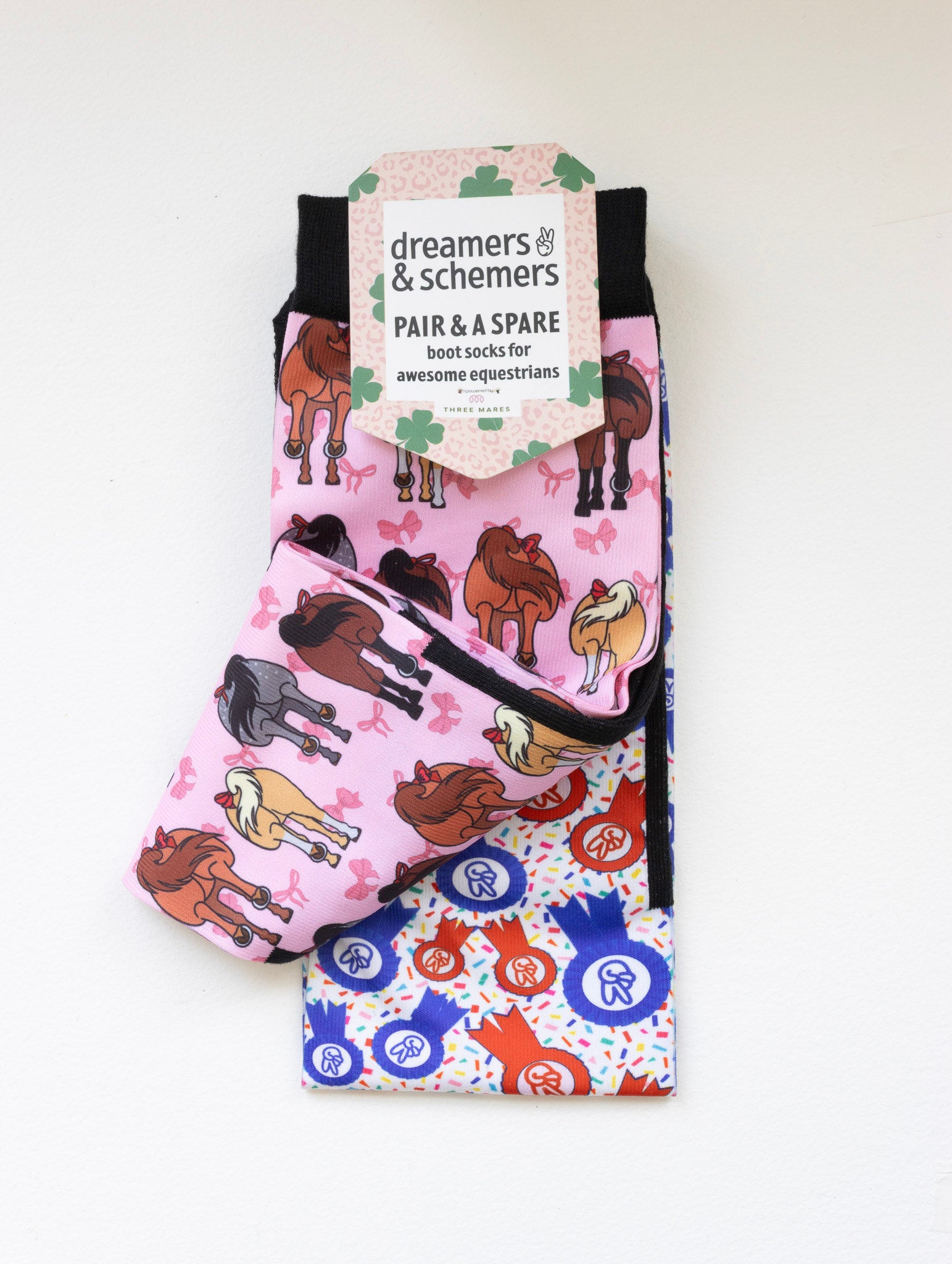 Red Ribbon Girlies boot socks shown folded with the included spare sock and printed cuff detail