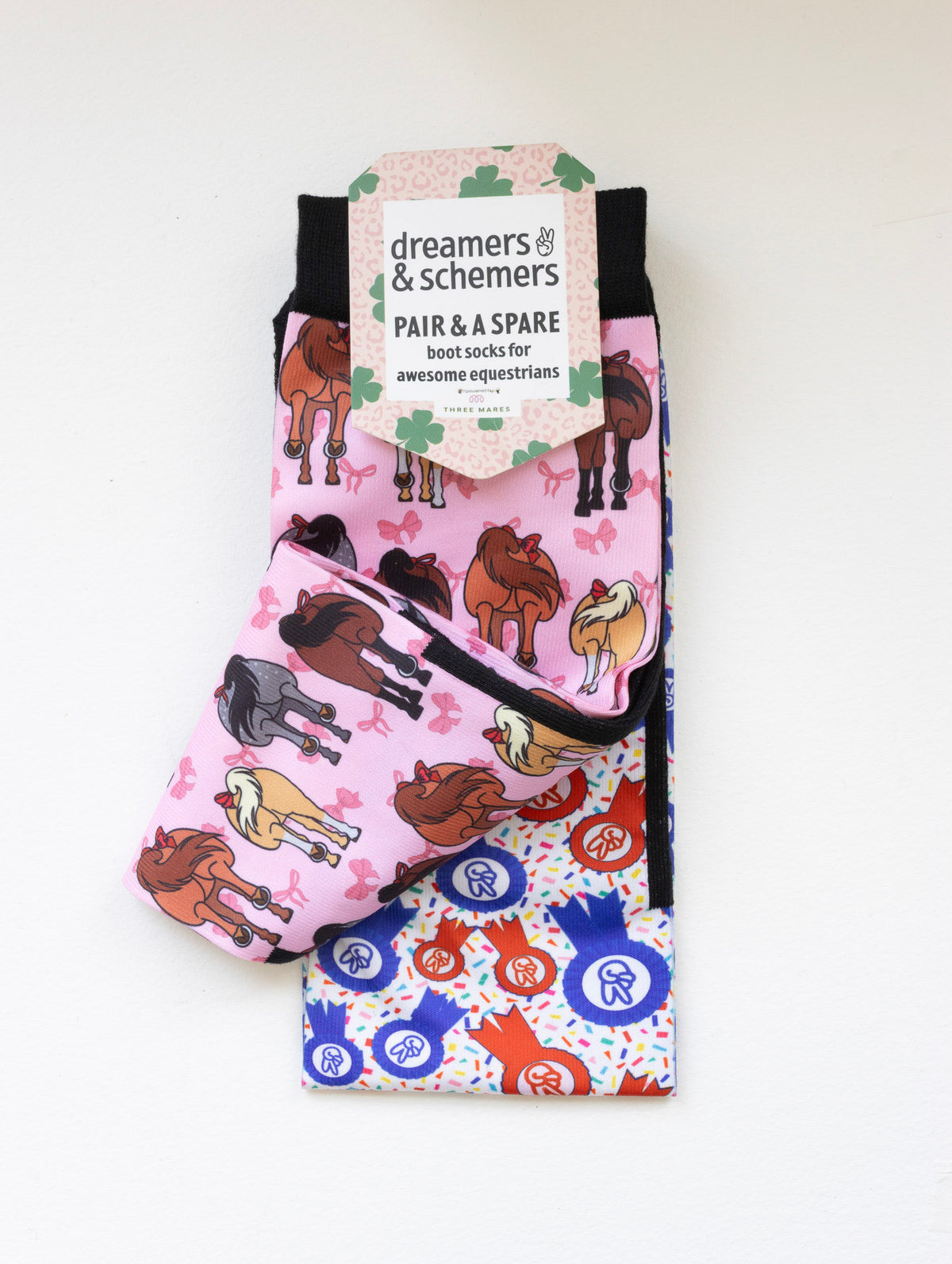 Red Ribbon Girlies boot socks shown folded with the included spare sock and printed cuff detail