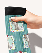Merry & Bright custom photo equestrian boot socks, held in hand, close-up of the string-light frame pattern, by Dreamers & Schemers