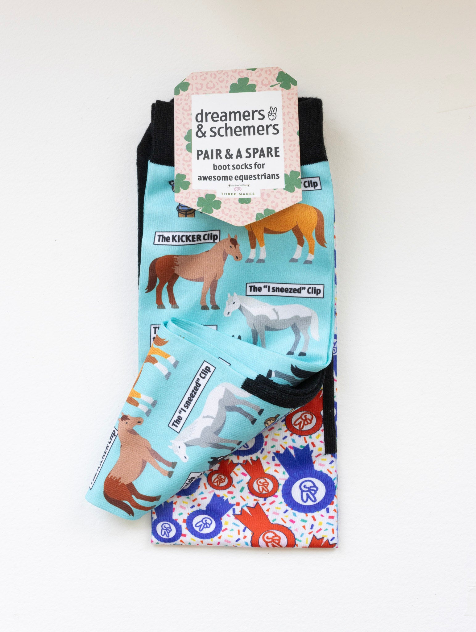 Clipart boot socks shown folded with the included spare sock and printed cuff detail