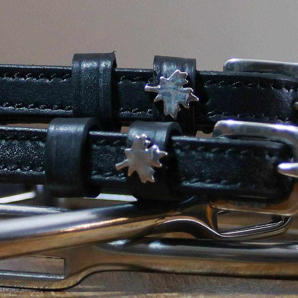 Black leather Canada Spur Straps with stainless steel maple leaf charms and buckles