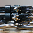Silver Fox Spur Straps black leather with stainless steel buckles and custom fox charm close-up