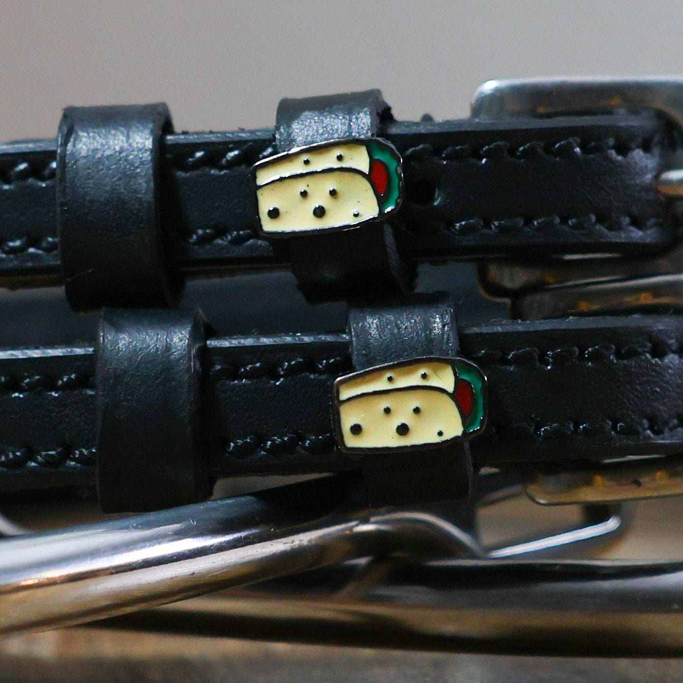 Black leather Burrito Spur Straps with stainless steel buckle and custom burrito charm