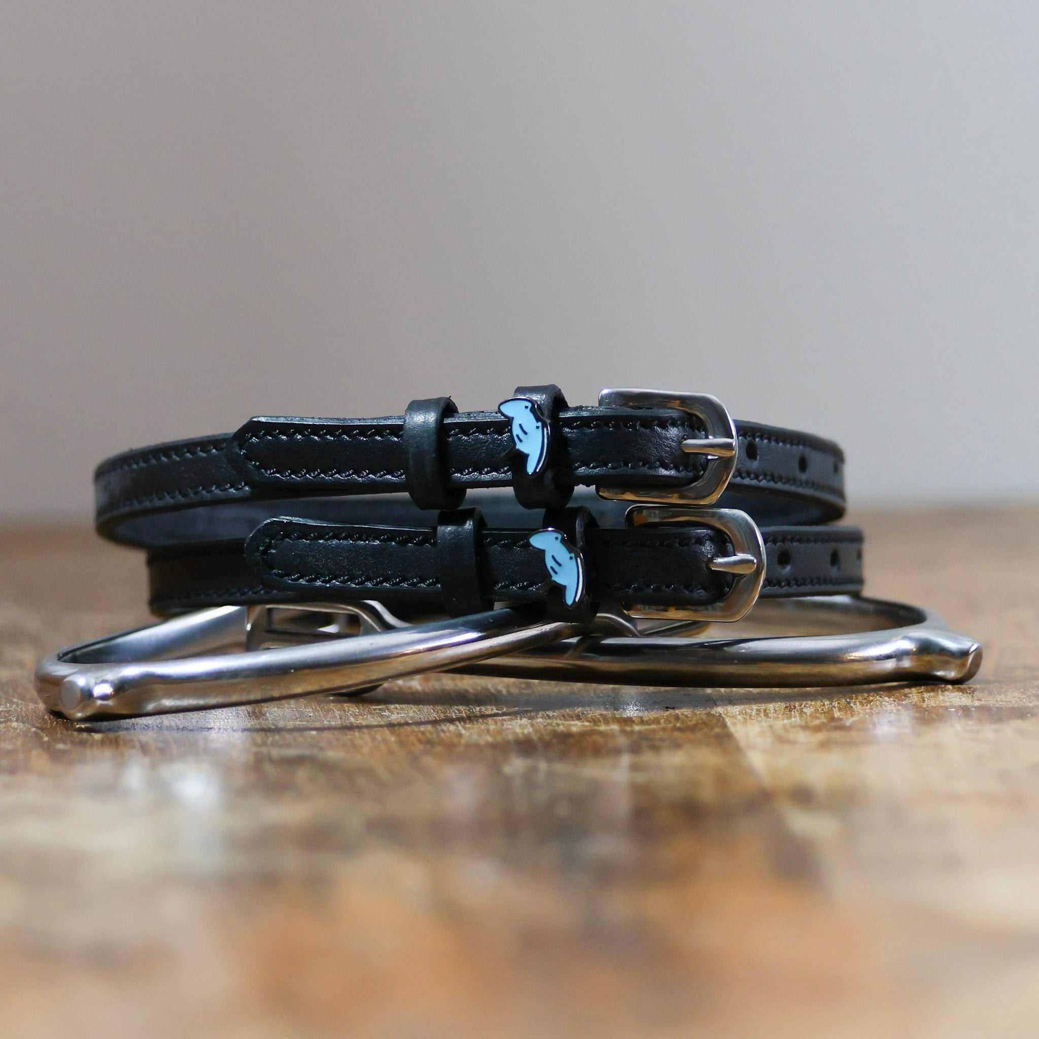 ManeJane Stingray Spur Straps Spur Straps — black leather, non-stretch, hero image for English riders.