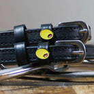 Black leather Olive Spur Straps with stainless steel buckles and custom olive-shaped charm