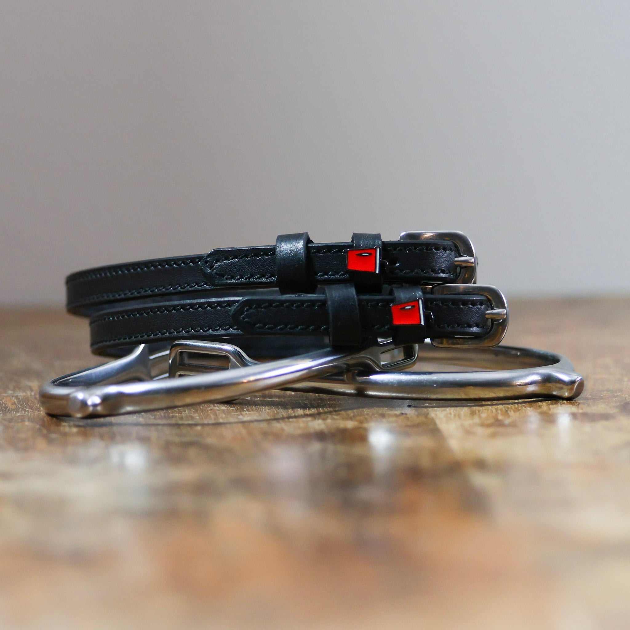 ManeJane Soda Spur Straps Spur Straps — black leather, non-stretch, hero image for English riders.