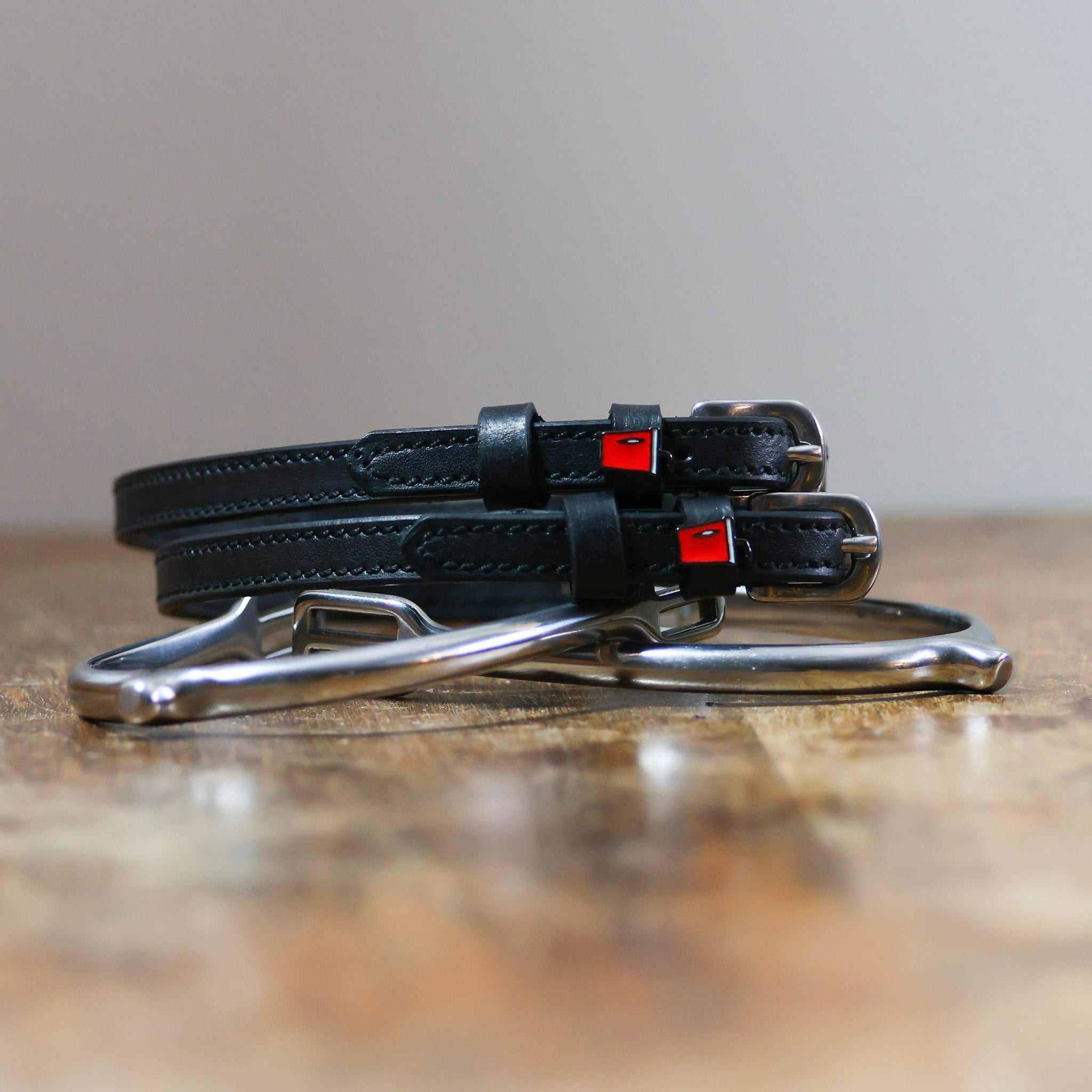 ManeJane Soda Spur Straps Spur Straps — black leather, non-stretch, hero image for English riders.