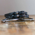 ManeJane Silver Apple Spur Straps Spur Straps — black leather, non-stretch, hero image for English riders.