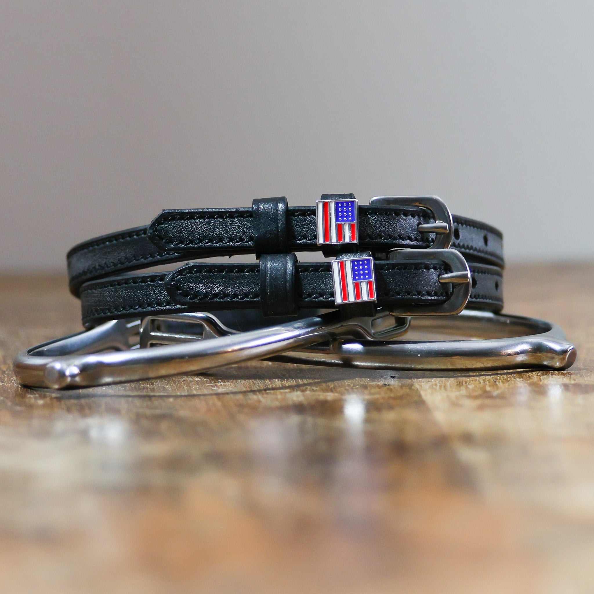 America Spur Straps black leather with American flag charm and stainless steel buckle
