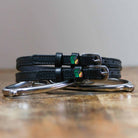 ManeJane Dumpster Fire Spur Straps Spur Straps — black leather, non-stretch, hero image for English riders.