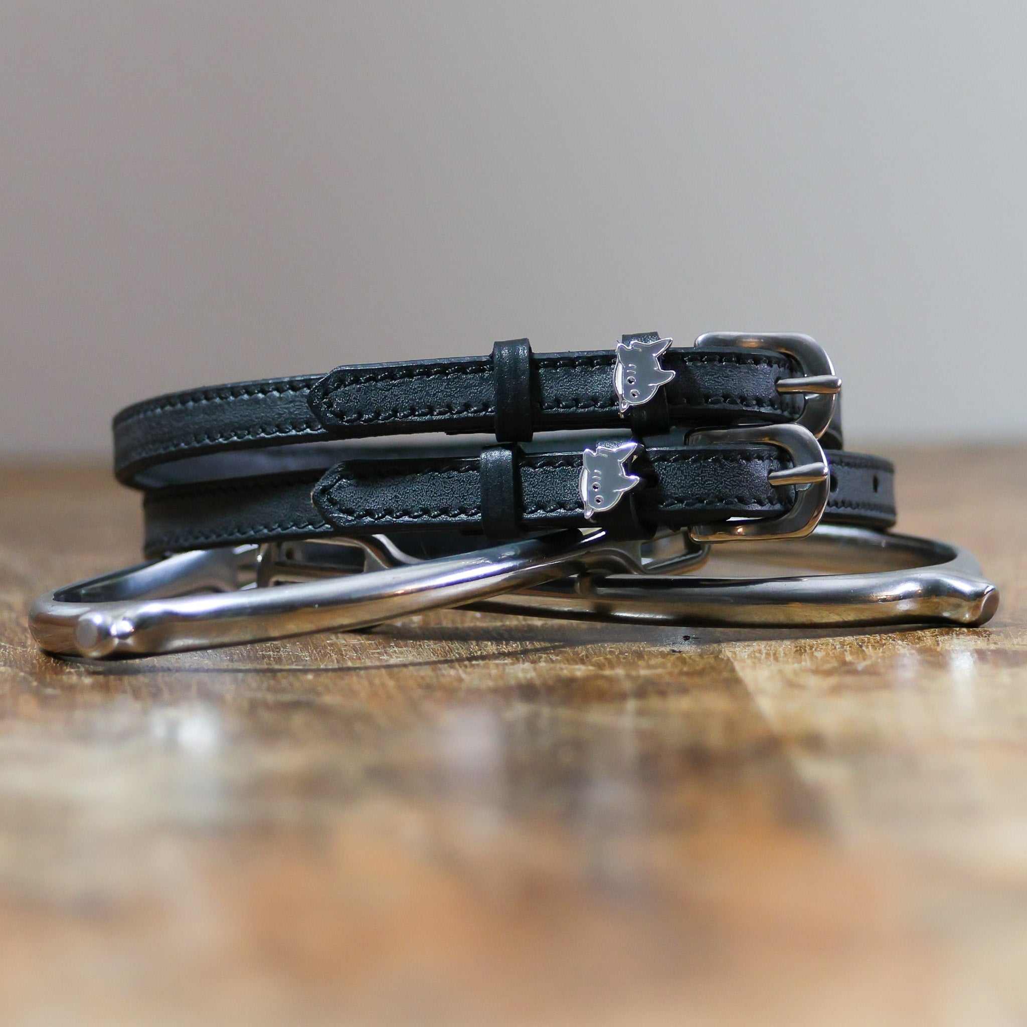 ManeJane SHARK 🦈 Spur Straps Spur Straps — black leather, non-stretch, hero image for English riders.