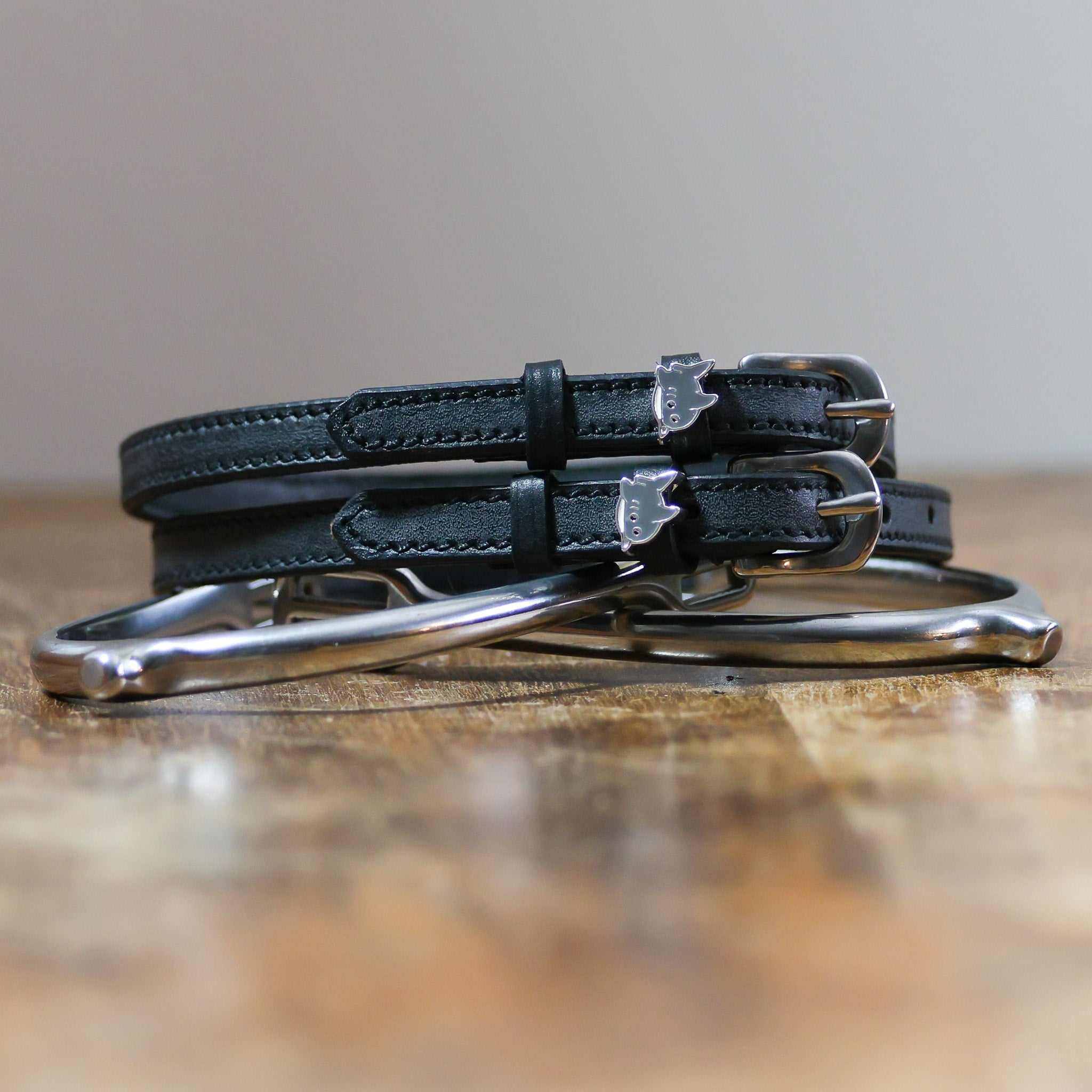 ManeJane SHARK 🦈 Spur Straps Spur Straps — black leather, non-stretch, hero image for English riders.