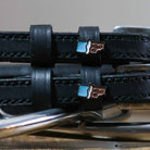 Chocolate Bar Spur Straps in black leather with stainless steel buckle and custom chocolate bar charm