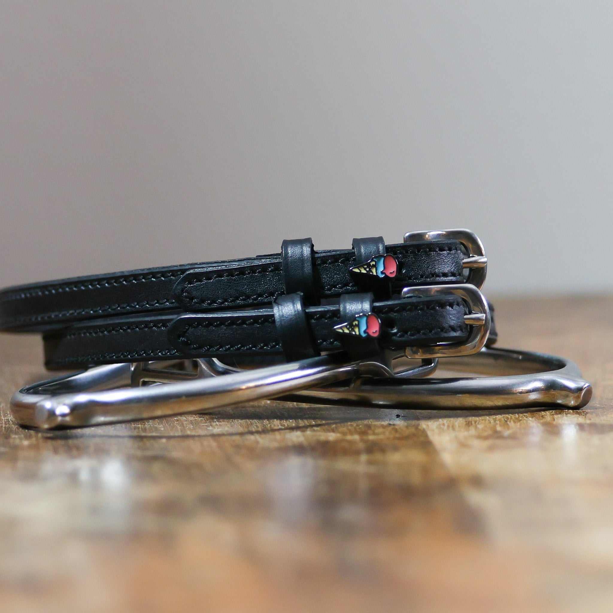 ManeJane Ice Cream Cone Spur Straps Spur Straps — black leather, non-stretch, hero image for English riders.