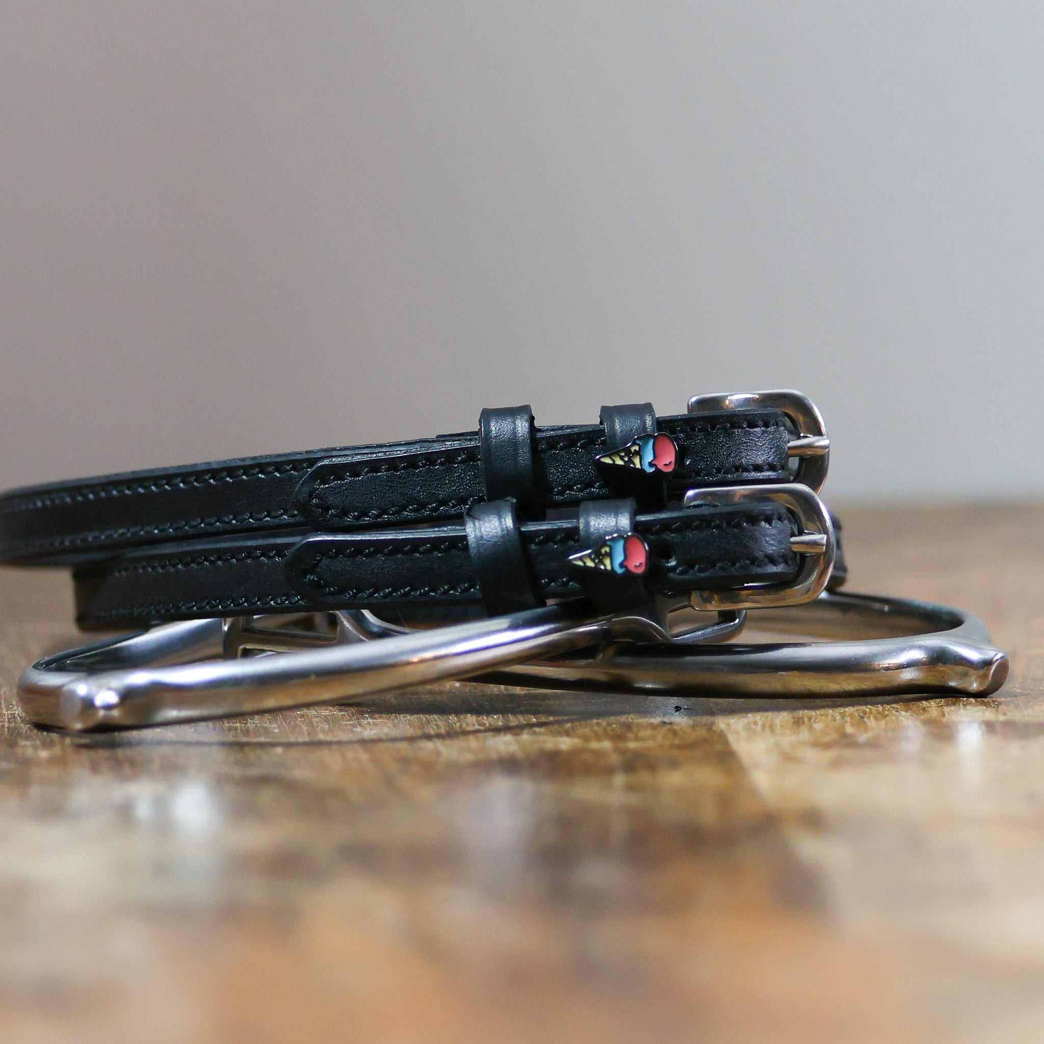 ManeJane Ice Cream Cone Spur Straps Spur Straps — black leather, non-stretch, hero image for English riders.
