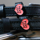 Black leather Pony Love Spur Straps with heart-shaped charm and stainless steel buckle