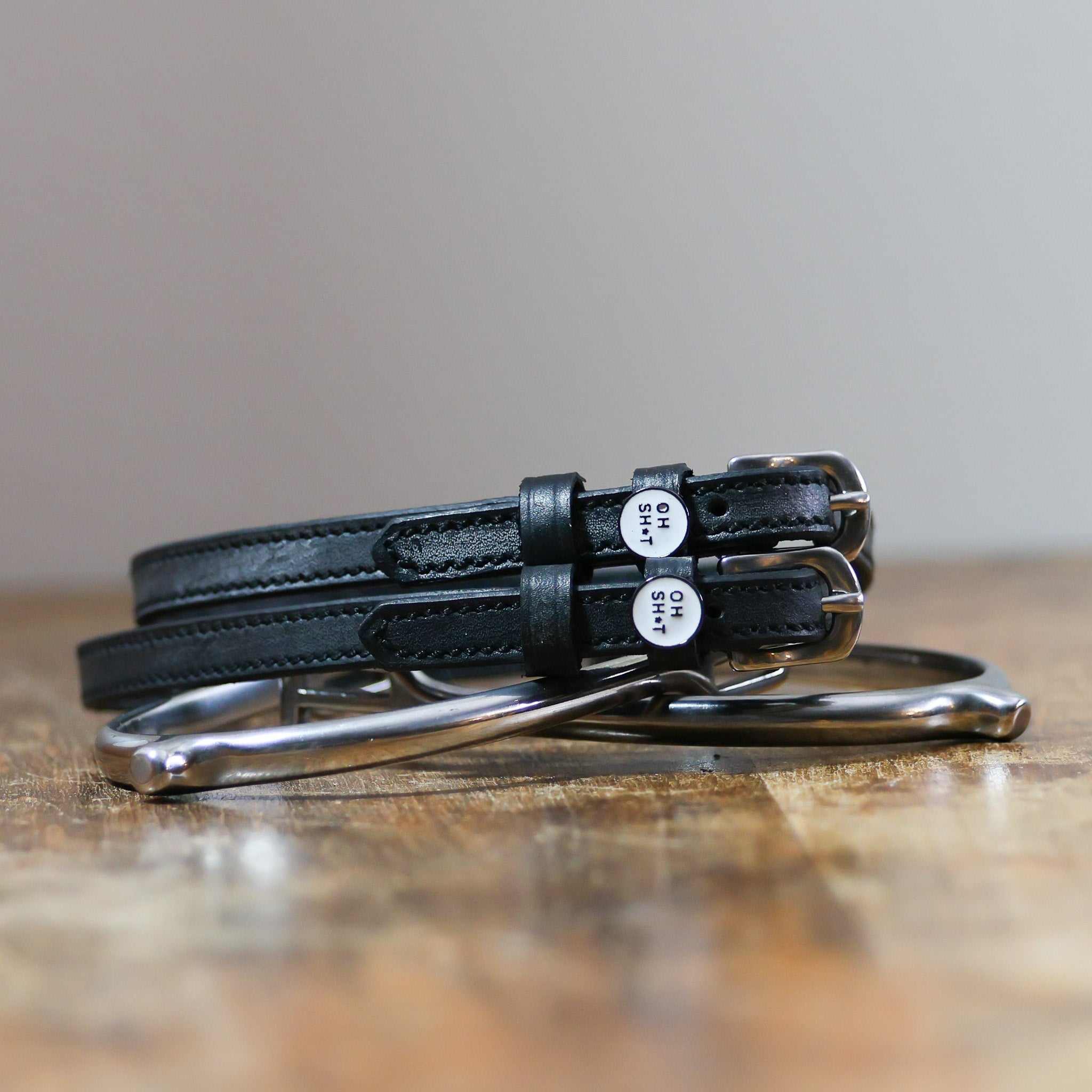 ManeJane Oh Sh*t Spur Straps Spur Straps — black leather, non-stretch, hero image for English riders.