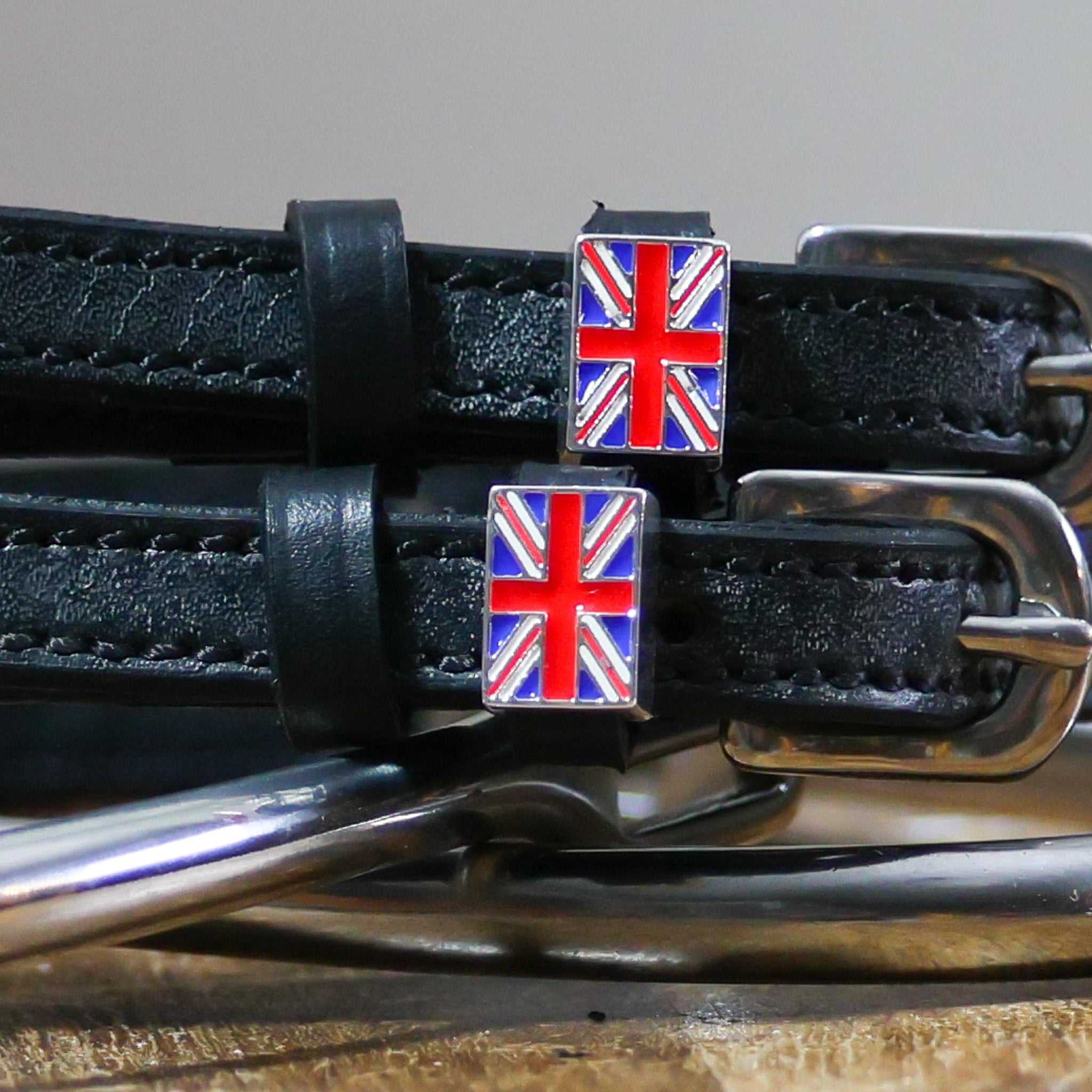 Black leather spur straps with Great Britain Flag charm and stainless steel buckles