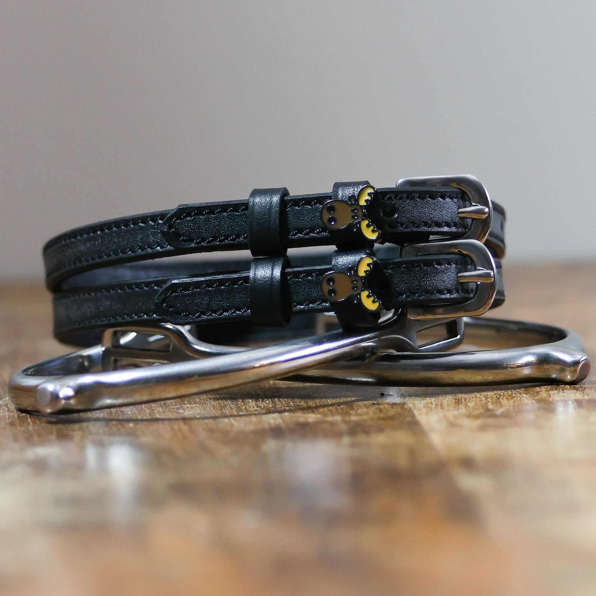 ManeJane Moose Spur Straps Spur Straps — black leather, non-stretch, hero image for English riders.