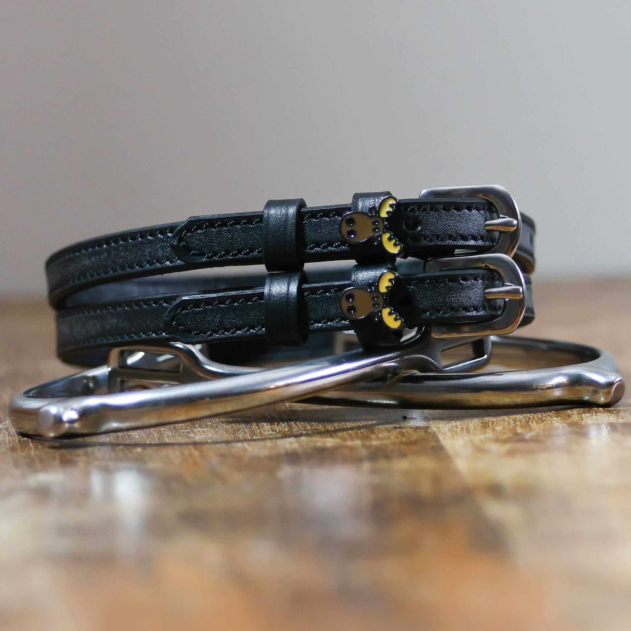 ManeJane Moose Spur Straps Spur Straps — black leather, non-stretch, hero image for English riders.