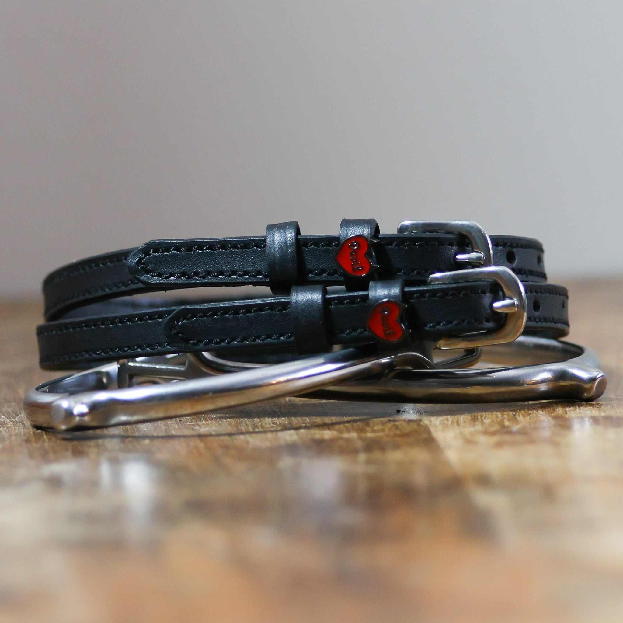 ManeJane Devil Heart Spur Straps Spur Straps — black leather, non-stretch, hero image for English riders.