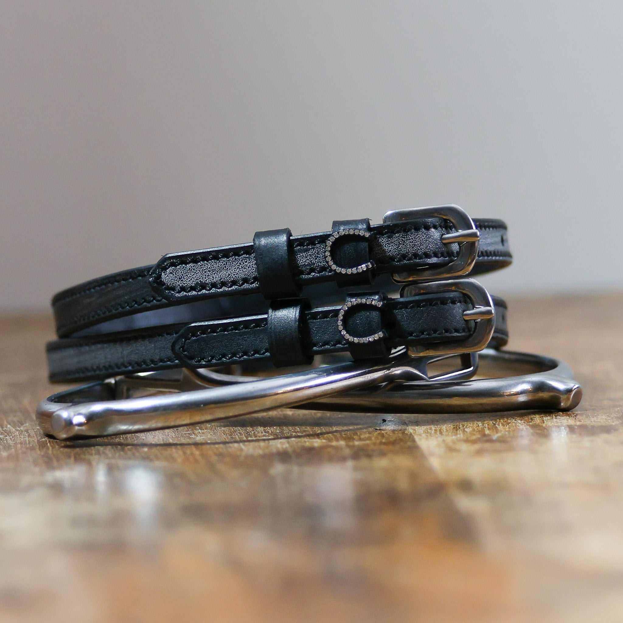 ManeJane Horse Shoes - Silver Bling Spur Straps Spur Straps — black leather, non-stretch, hero image for English riders.