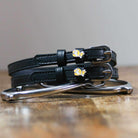 ManeJane Corgi Butts Spur Straps Spur Straps — black leather, non-stretch, hero image for English riders.