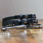 ManeJane Happy Face Spur Straps Spur Straps — black leather, non-stretch, hero image for English riders.