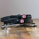 ManeJane Canadian Flag Spur Straps Spur Straps — black leather, non-stretch, hero image for English riders.