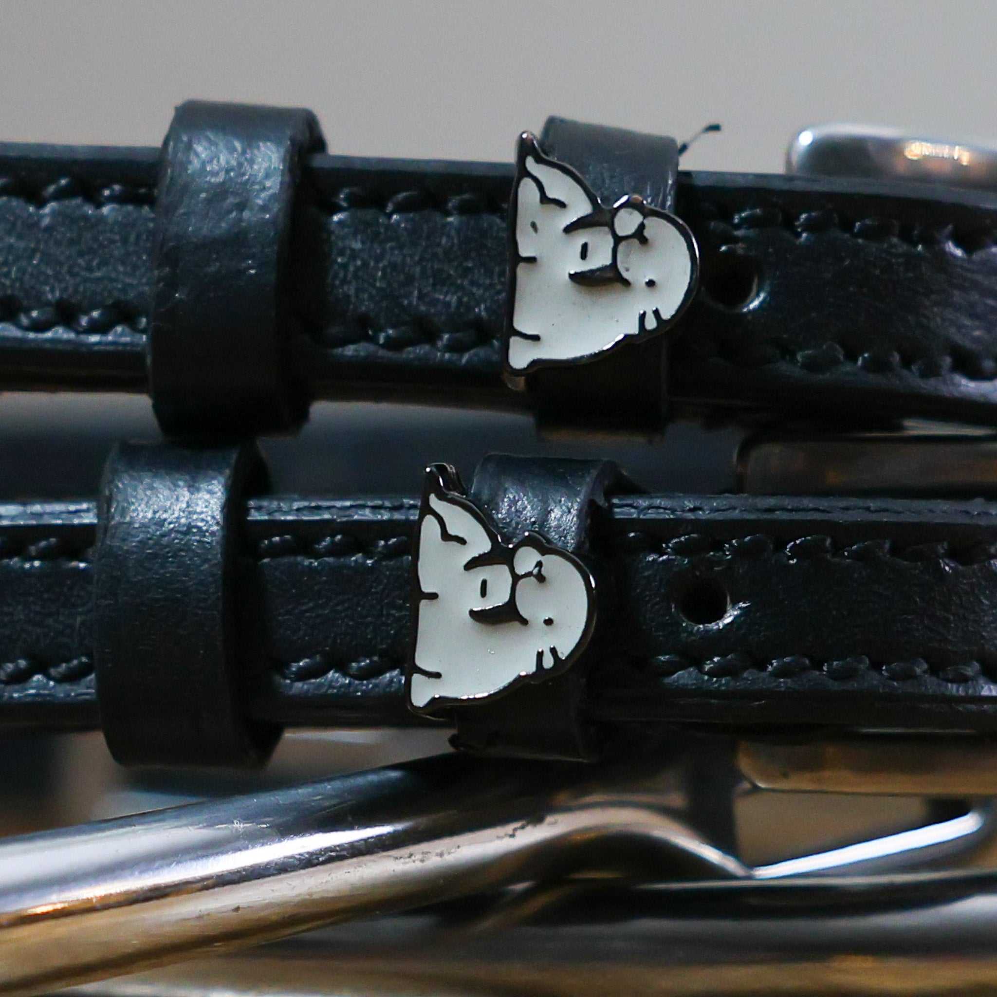 Black leather Walrus Spur Straps with stainless steel buckle and custom walrus charm