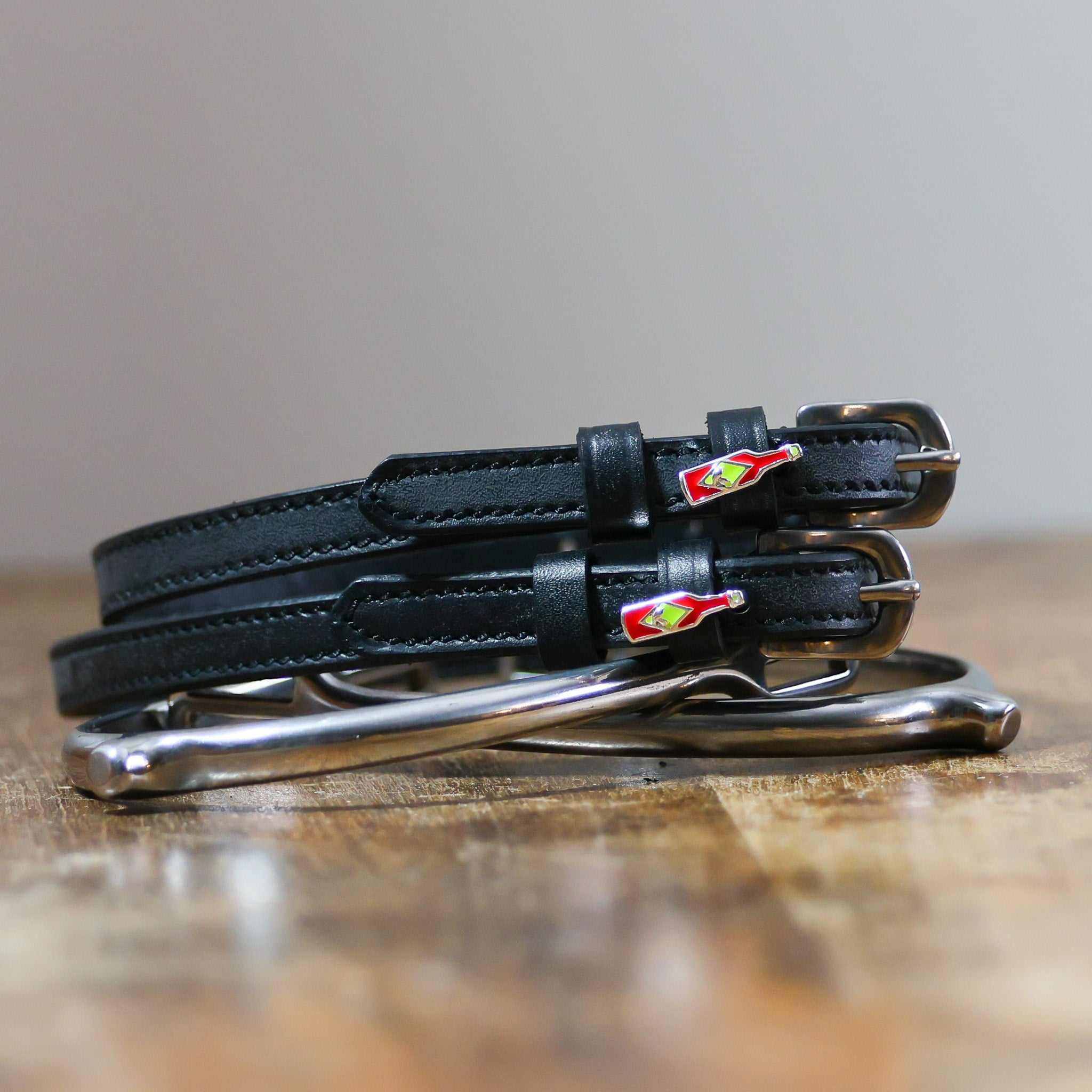 ManeJane Hot & Spicy Spur Straps Spur Straps — black leather, non-stretch, hero image for English riders.